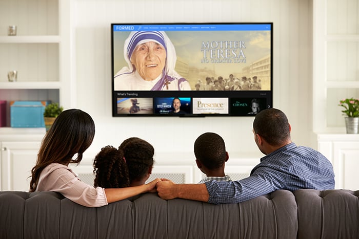 Family watching Mother Teresa Movie on FORMED